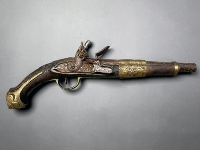 Pistolet oriental, à silex
Garnitures en...