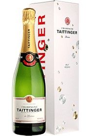Une bouteille de CHAMPAGNE TAITTINGER grande...