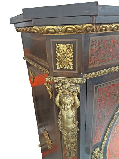 Blackened wood veneer and Boulle marquetry...