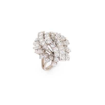 DIAMOND DOME RING
Paved with brilliant-cut...