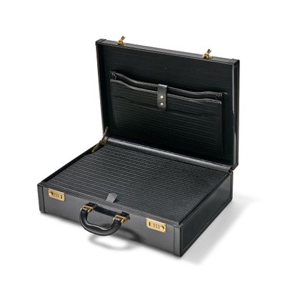 PRADA SUITCASE
In black patent box leather...