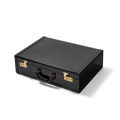 PRADA SUITCASE
In black patent box leather...