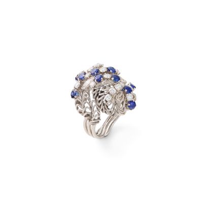 VAN LEDA SAPPHIRE AND DIAMOND DOME RING
The...
