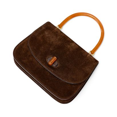 GUCCI BAG
Chocolate suede with carnelian-colored...
