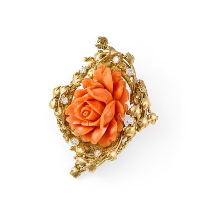 VAN LEDA IMPORTANT CORAL DIAMOND PENDANT
This...