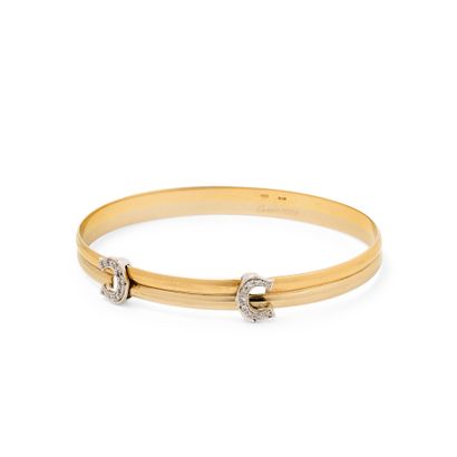 CARTIER ARTICULATED BANGLE BRACELET
In 18K...