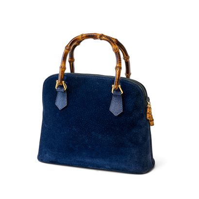 GUCCI BAMBOO BAG
In navy-blue suede with...