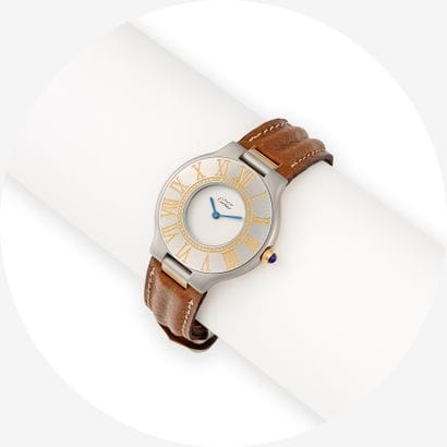 CARTIER MUST 21 WATCH
In steel with bezel...