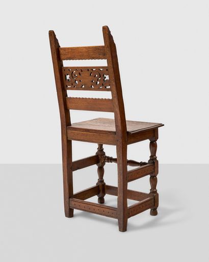 CHAISE EN CHÊNE
sculpté et ajouré à décor...