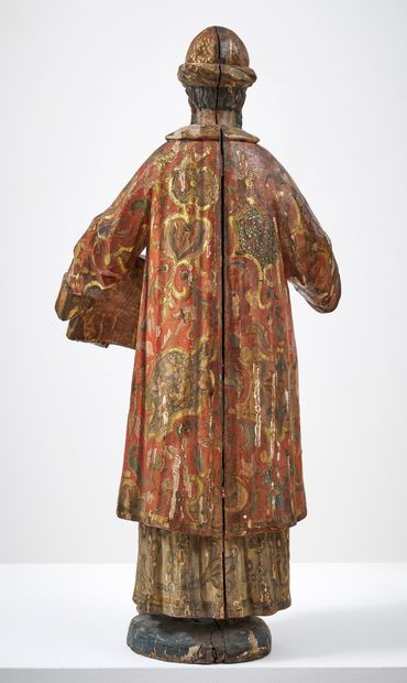 SAINT PERSONNAGE
en bois de résineux sculpté...