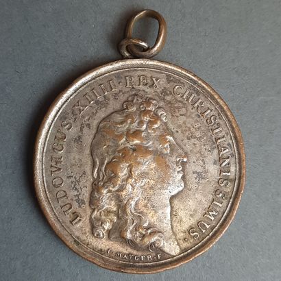 MEDAILLE à l'effigie de Louis XIV en bronze...