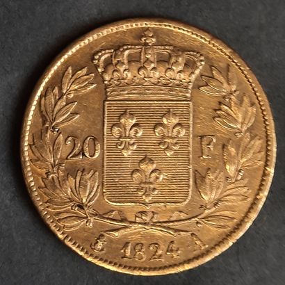 PIECE de 20 F or à l'effigie de Louis XVIII...