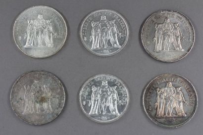 Quatre pièces de 50 FF et deux pièces de...