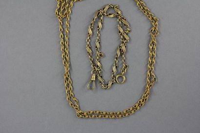 Chaine de cou et chaine de montre en or jaune...