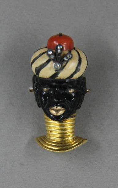 CARTIER
Clip de revers Blackamoor en or jaune...