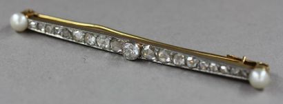Broche ligne en or jaune et gris 18k sertie...