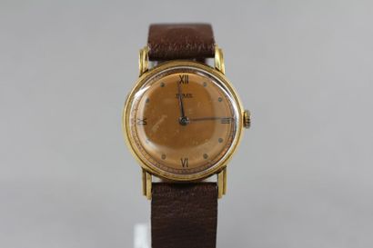 THALES
Montre d'homme à boitier rond en or...