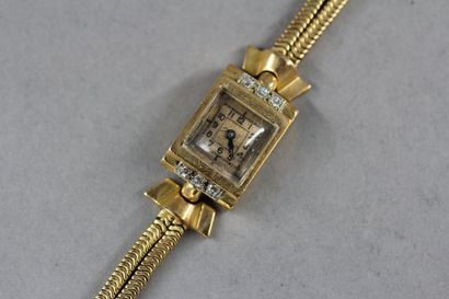 Bracelet-montre de dame en or jaune 18k et...