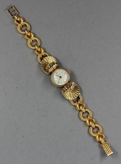 LAURENS
Bracelet-montre de dame en or jaune...