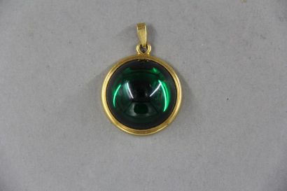 LALIQUE France
Pendentif rond en métal doré...