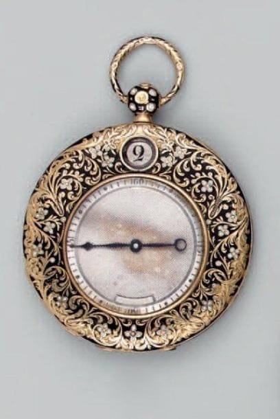 Montre de dame,plate, à clef à remontage...