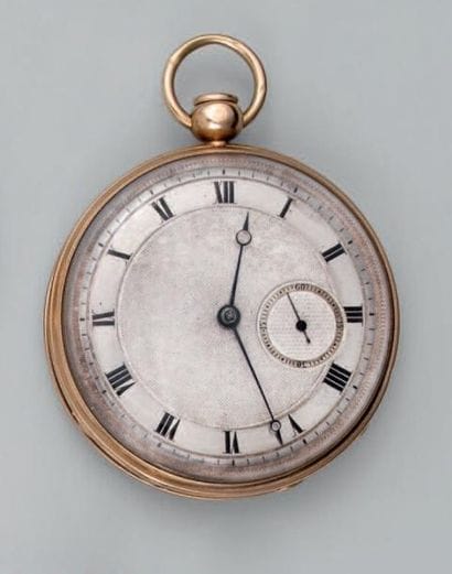 Montre de pocheà clef à remontage par le...