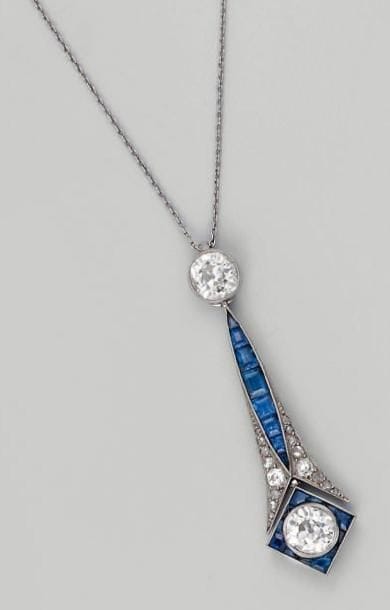 Collier articulé en or gris, supportant en...