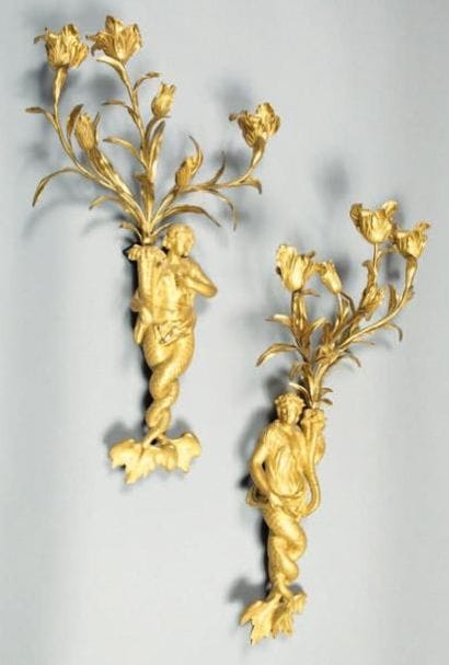 Paire d'appliques à trois lumières, en bronze...