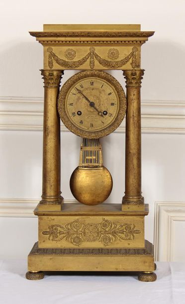 Portico clock in chased and gilded bronze,...