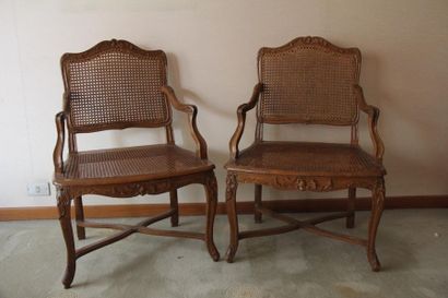 Pair of caned armchairs with flat, shouldered...