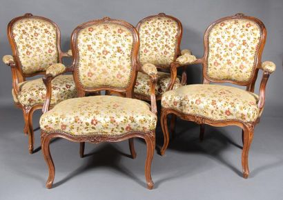 Four convertible armchairs in natural wood...