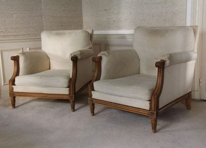 Paire de bergères basses en bois naturel,...
