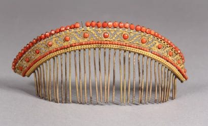 Brass hair comb decorated with flowers and...