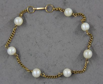 Bracelet in 18k yellow gold and cultured...