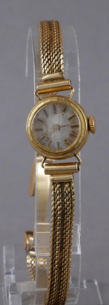 *Bracelet-montre de dame à boitier rond en...
