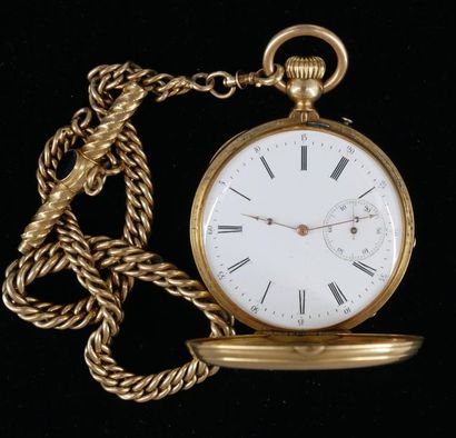 *Montre savonnette en or jaune 18k guilloché...
