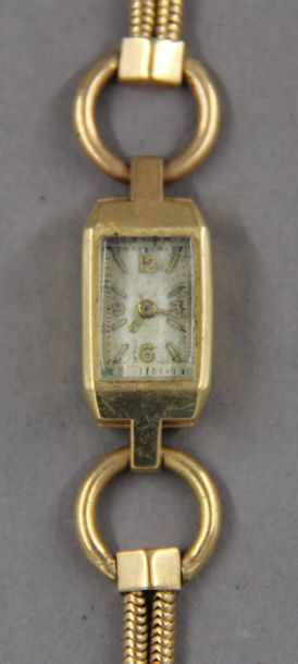Bracelet-montre de dame en or jaune 18k à...