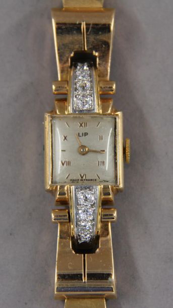 LIP
Bracelet-montre de dame en or jaune 18k...