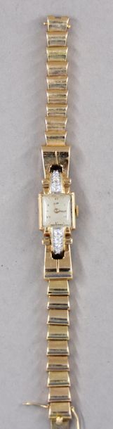 LIP
Bracelet-montre de dame en or jaune 18k...