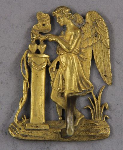 Elément de porte-montre en bronze doré à...