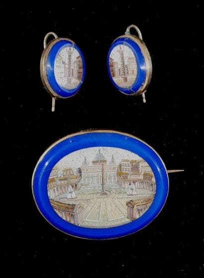 *Oval brooch and pair of sleepers in 18k...