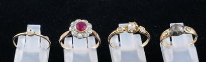 *Four rings in 18k yellow gold set with pearls,...