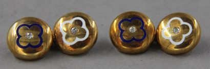 Paire de boutons de manchettes ronds en or...