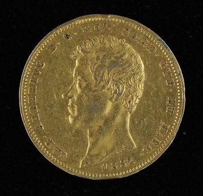 *Une pièce de 100 Lire en or 1832 (accidents...