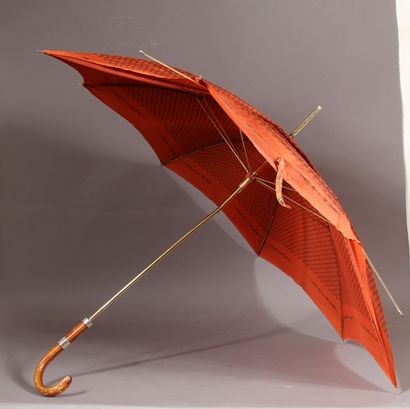*CELINE

Parapluie en nylon de soie orange...