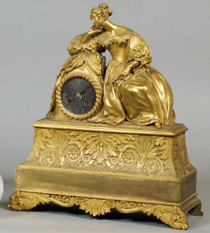 Pendule de cheminée en bronze doré représentant...