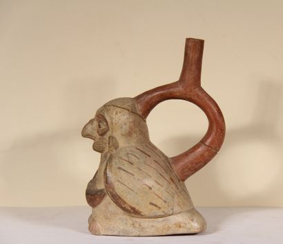 Stirrup vase representing a man with a bird's...