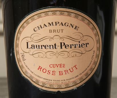 *Laurent PERRIER

Three bottles of brut champagne...