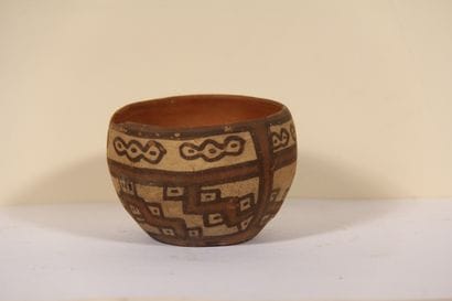 Bowl decorated with geometric patterns

Chancay...