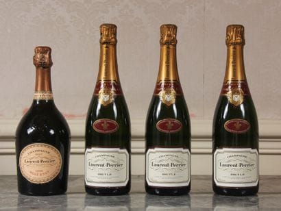 *Laurent PERRIER

Three bottles of brut champagne...